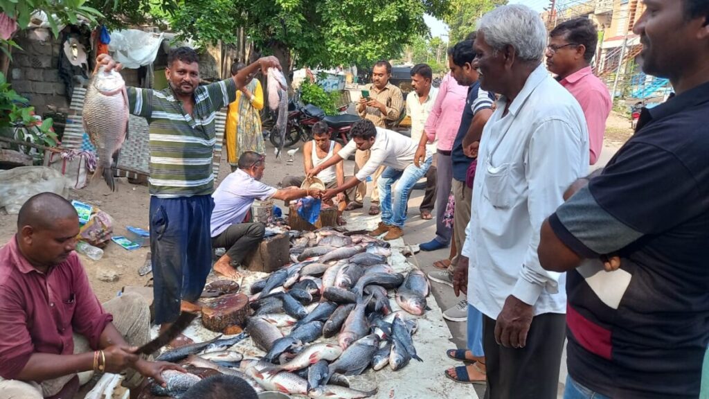 People throng shops for fish on the occasion of Mrigasira Karte