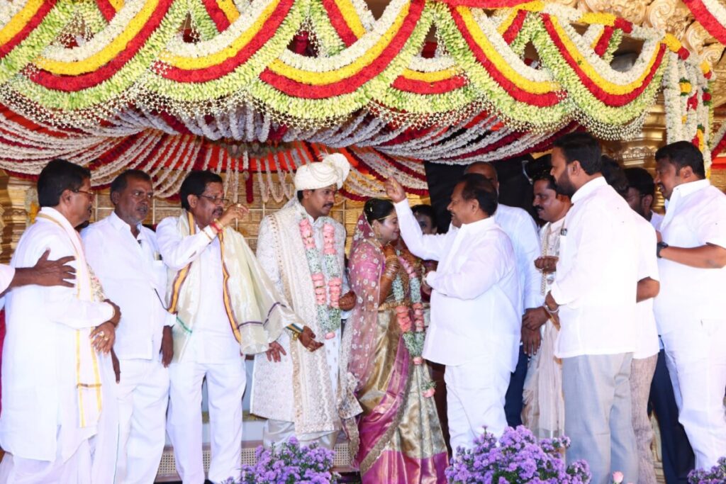 Former minister Dr A Chandrasekhar congratulated the newlyweds who attended the wedding ceremony