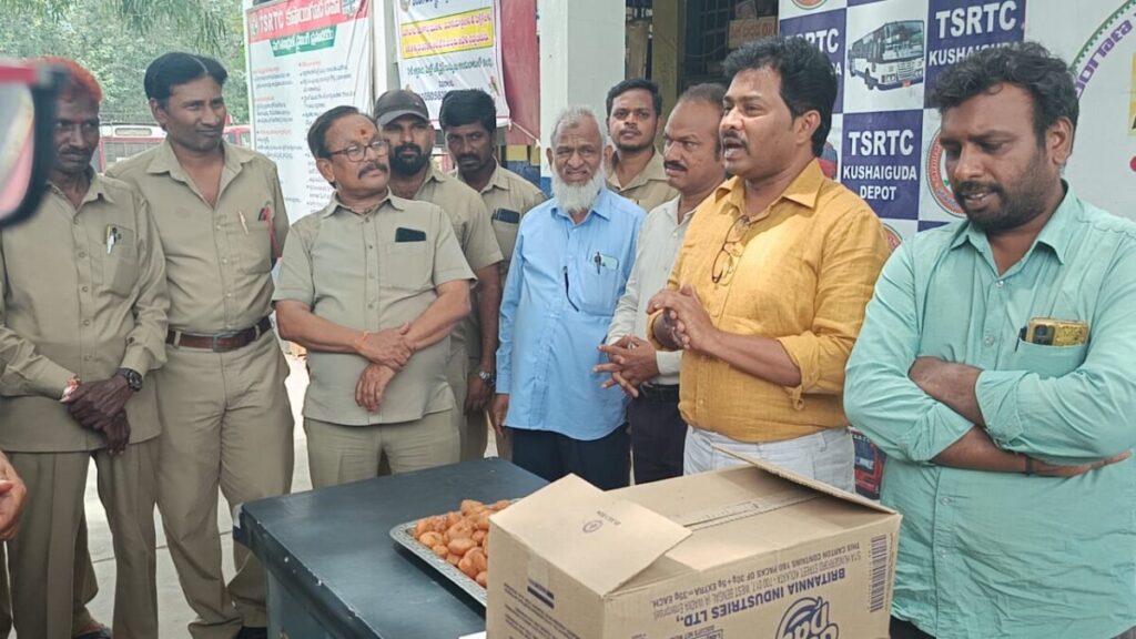 Depot manager Mahesh Kumar who distributed the sweet