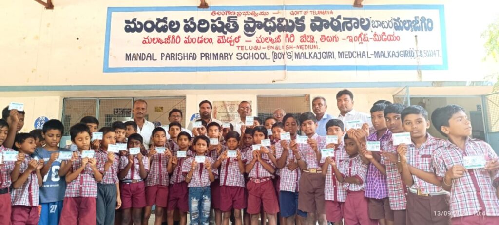 DM Sridhar distributed free bus passes to Zilla Parishad Primary School students