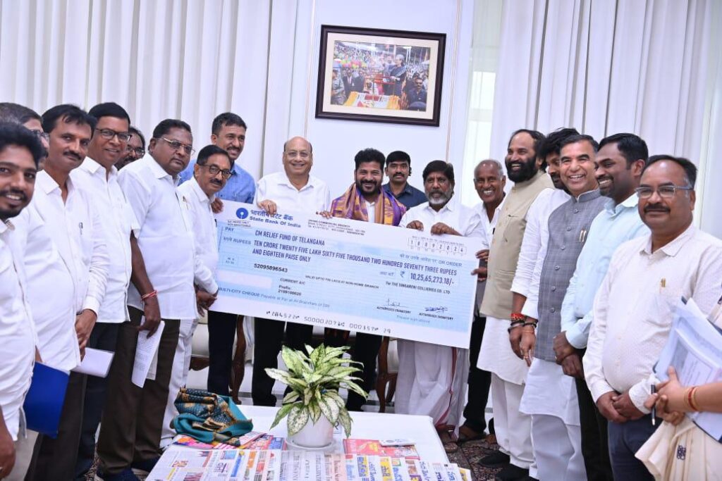 Singareni colliery officials for Telangana flood victims