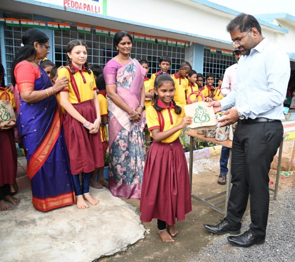 Collector Koya Sri Harsha distributed clay Ganpati idols