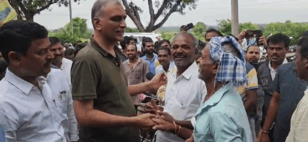 Harish Rao talks to farmers