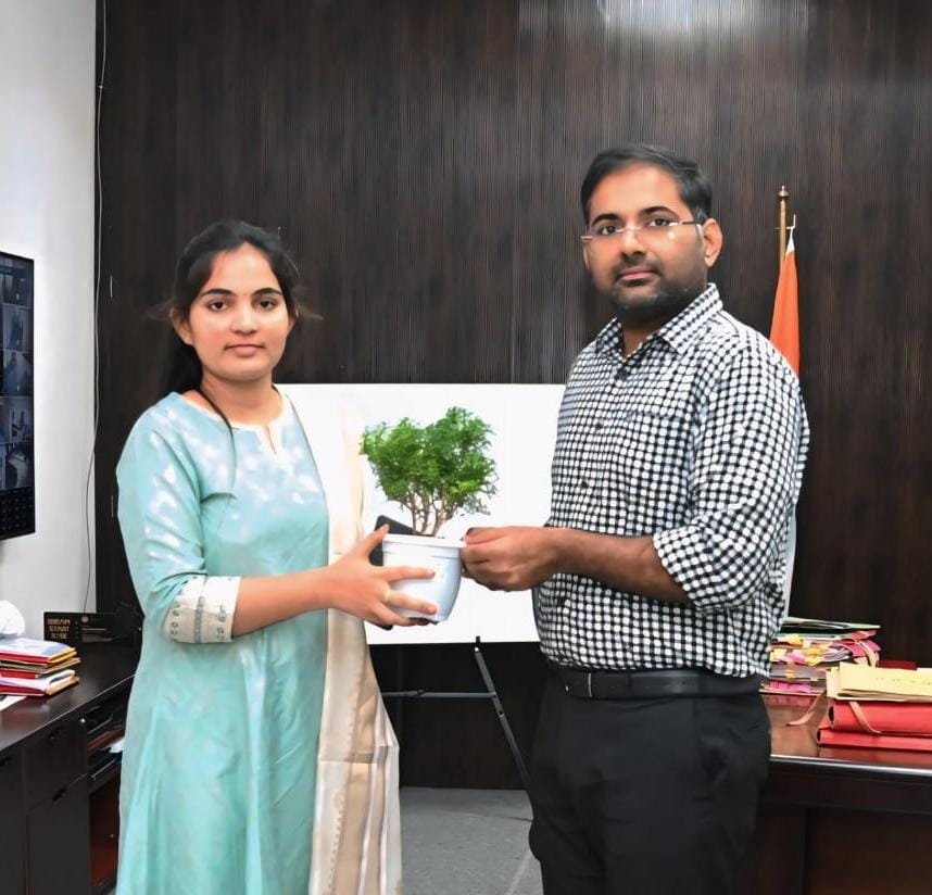 New Group 1 employee meets District Collector 