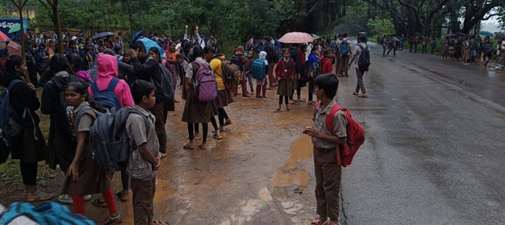 Students get wet in the rain