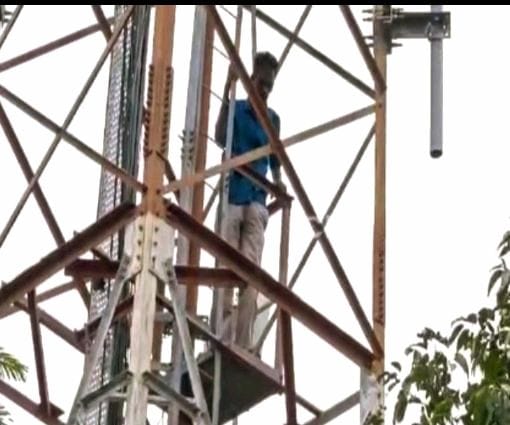 YCP leader climbs cell tower