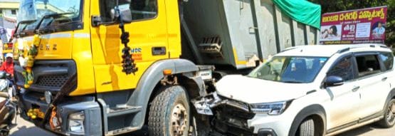 A car hit a tipper lorry