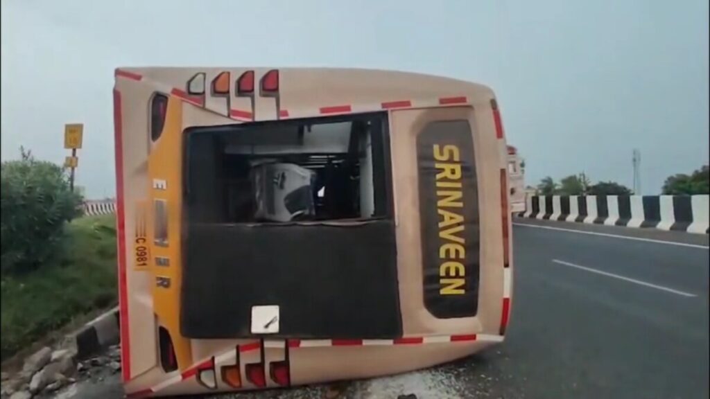 Private travel bus overturns