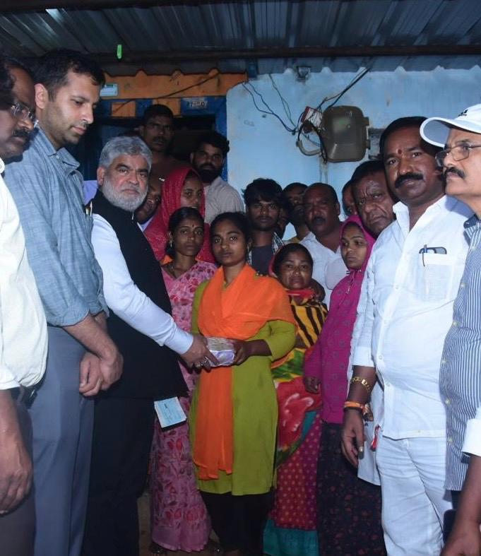 Cheque distributed to Tarabai's family