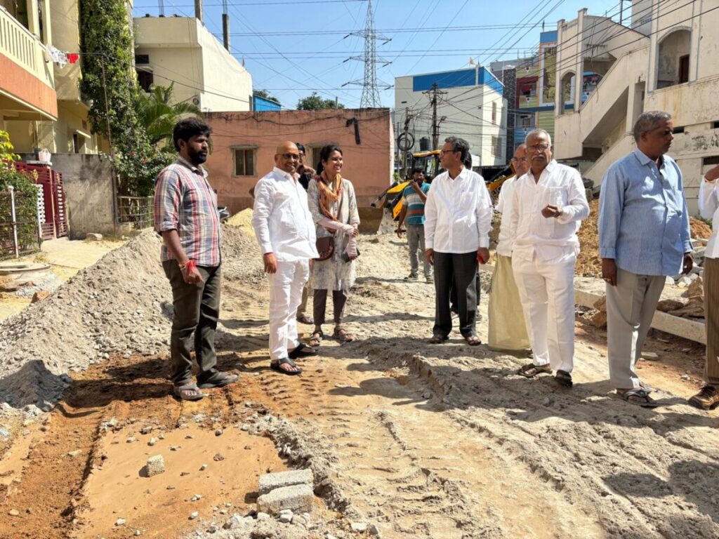 Corporator Venkatesh Goud inspects CC road construction work