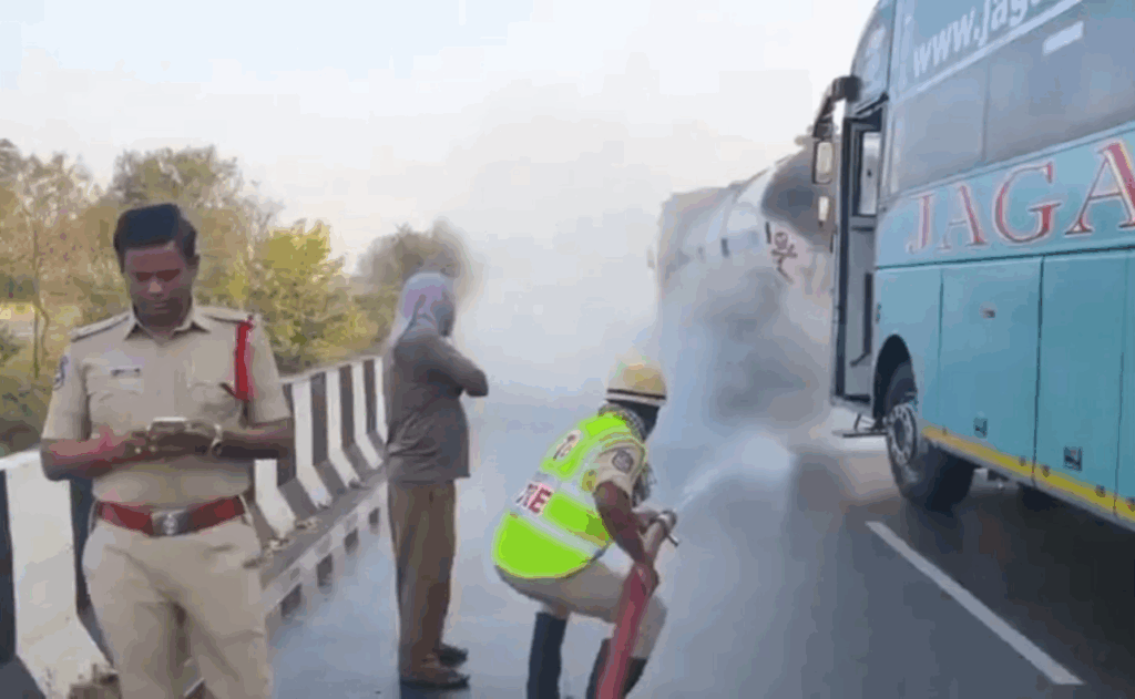 Private bus hits acid tanker