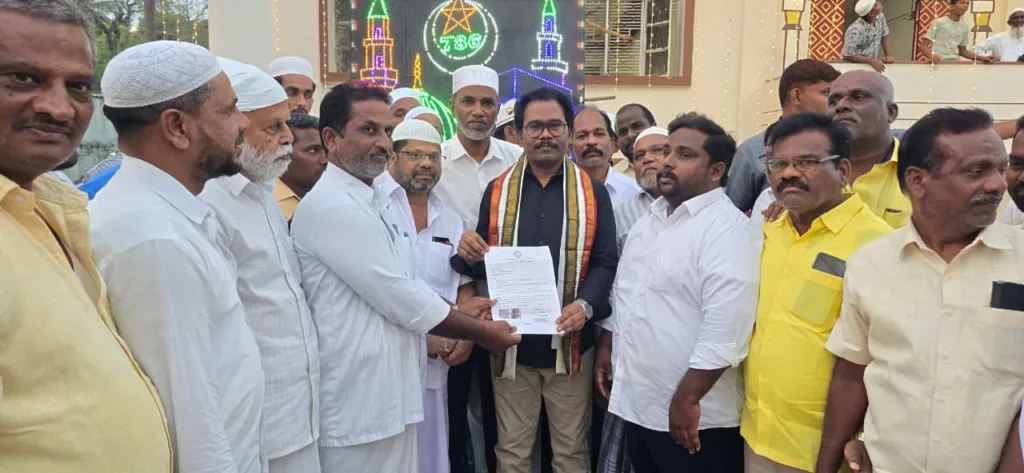 MLA Thomas presents a cheque 